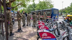 Security personnel deployed at Connaught Place, a day before the nationwide mock drills ordered by the Ministry of Home Affairs, in New Delhi. (PTI)