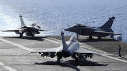 A Rafale Marine fighter jet taxis on the flight deck of France's Charles de Gaulle nuclear-powered aircraft carrier operating in the Mediterranean Sea. India and France are set to finalize the Rafale Marine fighter jet deal in April 2025. (IMAGE: REUTERS)